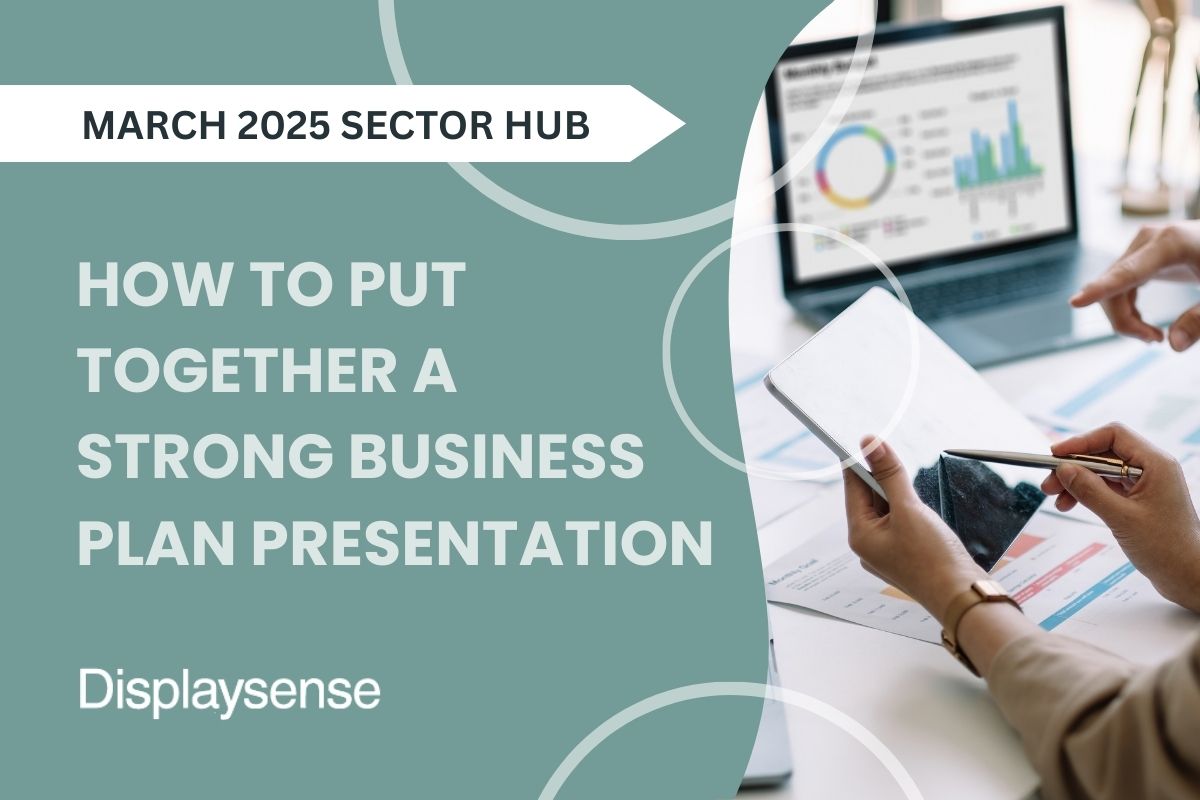 March 2025 Sector Hub by Displaysense on how to put together a strong business plan presentation, featuring hands reviewing printed documents and graphs with a tablet and a laptop displaying charts.