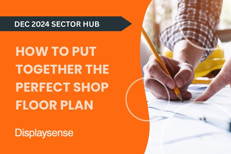 December 2024 Sector Hub by Displaysense on how to put together the perfect shop floor plan, featuring a close-up of a person sketching a layout with a pencil on architectural blueprints.