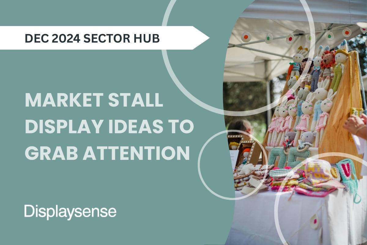December 2024 Sector Hub by Displaysense featuring market stall display ideas to grab attention, showing a colourful outdoor stall with hanging plush toys, table décor, and a canopy setup.