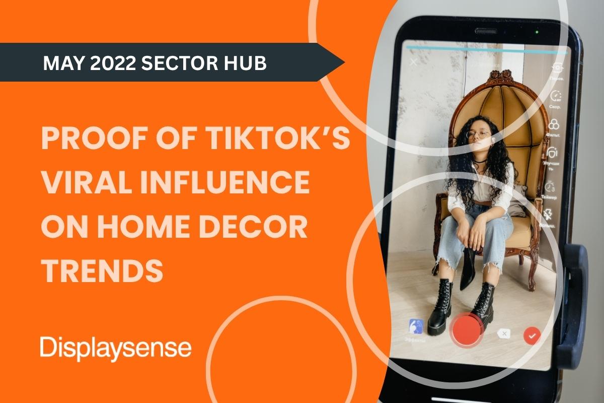 May 2022 Sector Hub by Displaysense showing proof of TikTok’s viral influence on home décor trends, featuring a smartphone recording a stylish influencer seated in a modern boho chair inside a décor-rich space.