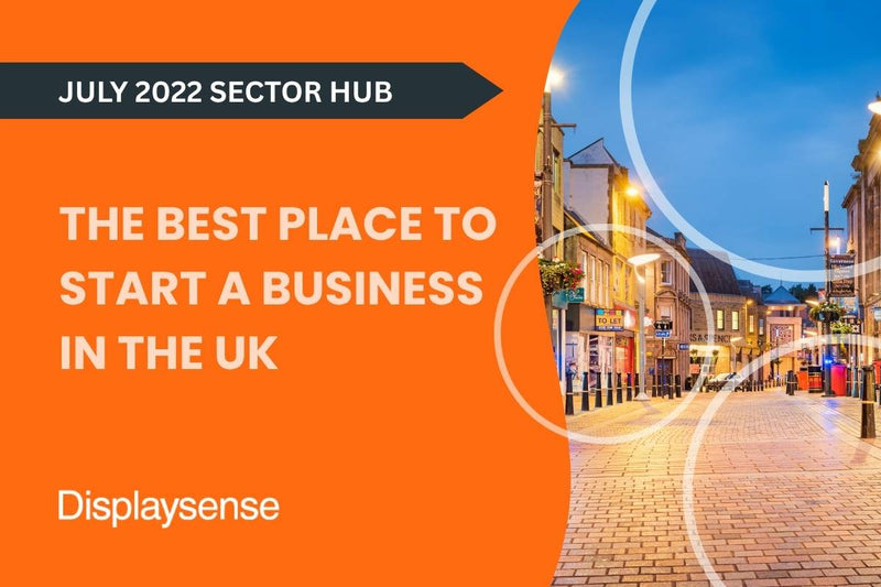 July 2022 Sector Hub by Displaysense highlighting the best place to start a business in the UK, featuring a picturesque high street at twilight with shops, streetlights, and cobbled pavement in a vibrant town centre.