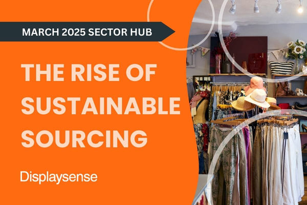 March 2025 Sector Hub by Displaysense exploring the rise of sustainable sourcing, featuring a boutique retail store with eco-friendly clothing racks, natural materials, and a customer browsing garments.