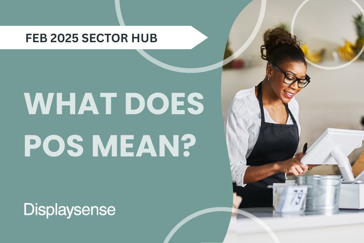 February 2025 Sector Hub by Displaysense explaining what POS means, featuring a smiling retail staff member using a modern point of sale touchscreen system at a shop counter.