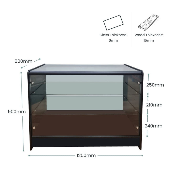 Detailed dimension guide for a 1200mm black wood and glass retail display counter, featuring 6mm glass, 15mm wood construction, 900mm height, 600mm depth, internal shelf spacing and lockable showcase access for merchandising products in shops, showrooms and commercial retail interiors.