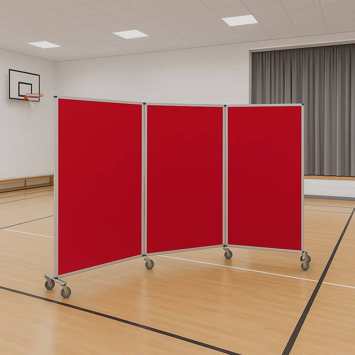 Mobile triple-panel noticeboard with a sleek aluminium frame and red felt surface, sized at 3600 x 1900mm. This double-sided design offers ample space for notices or displays and is equipped with locking castors for easy movement and secure positioning, ideal for professional and educational settings.