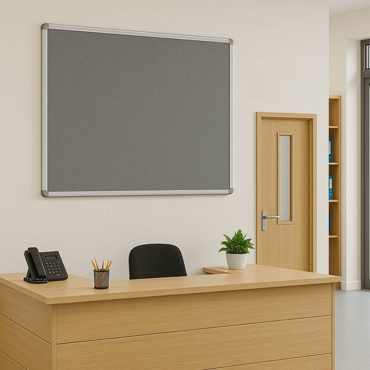 Fire-resistant noticeboard with a grey felt surface and aluminium frame, measuring 1500 x 1200mm. Suitable for larger displays.