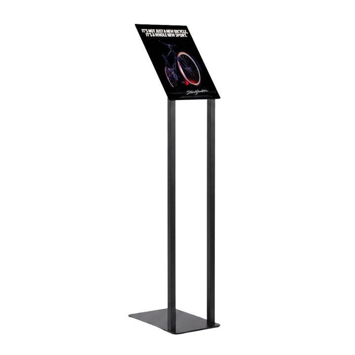 Black freestanding angled poster display stand with A3 graphic holder, slim metal construction and weighted base for indoor signage applications.