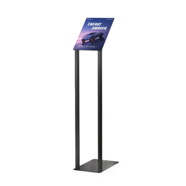 Black freestanding angled poster display stand featuring an A4 promotional graphic holder, ideal for retail, exhibitions and information displays.