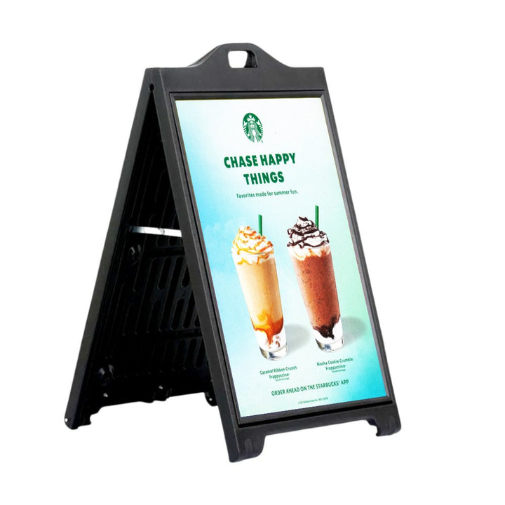 Satin black A-frame shown from the side, moulded carry handle at the top and a poster face held behind a clear protective cover for shopfront use.
