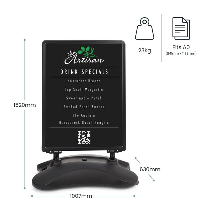 Dimension diagram of a black A0 waterbase pavement sign: 1520mm tall, 1007mm wide base, 630mm deep base, 23kg unit weight, fits A0 at 841 x 1189mm.
