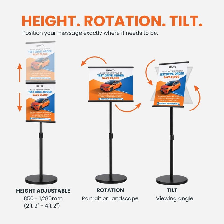 Black A3 freestanding poster display stand demonstrating adjustable height from 850 to 1285mm, portrait or landscape rotation and adjustable tilt for the viewing angle.