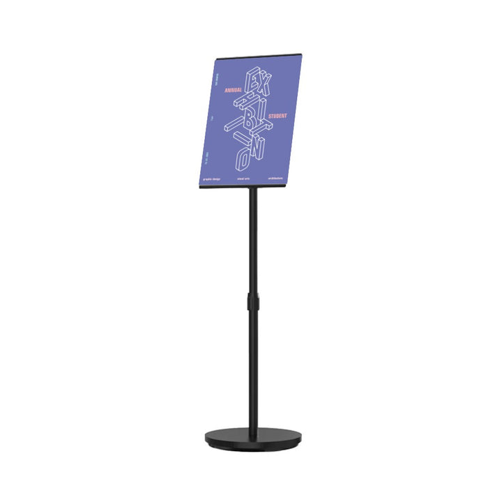 Angled cut-out of a black A4 telescopic display stand on a round weighted base, holding a printed A4 poster on a white background.
