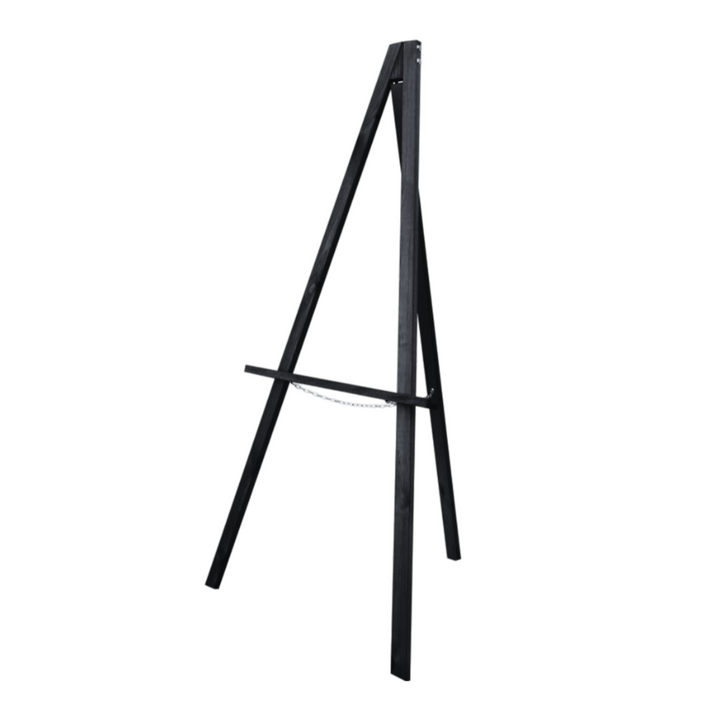 Black freestanding wooden easel with tripod base, angled A-frame legs and mid-level chain support, shown empty on a white background.
