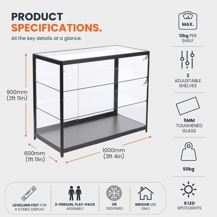 Black aluminium glass counter display cabinet measuring 1000 x 600 x 900mm, with two adjustable 5mm toughened glass shelves, 12kg shelf capacity, eight LED spotlights and levelling feet.