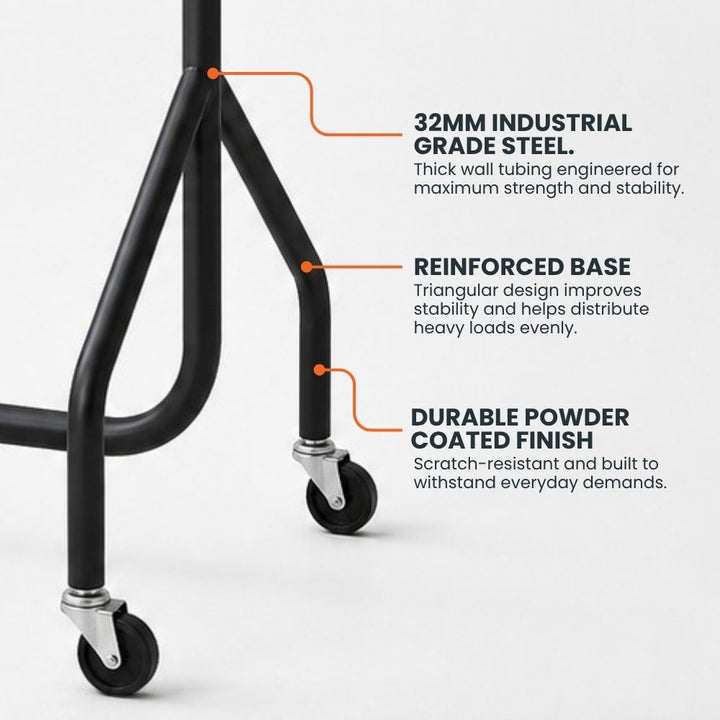 Black heavy duty clothes rail showing the 32mm powder-coated steel frame, reinforced triangular base and heavy duty castor wheels.