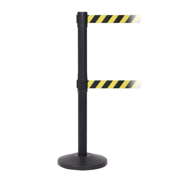 Black steel retractable barrier with twin chevron belts on a cast iron base and rubber floor ring, for retail and event crowd management.
