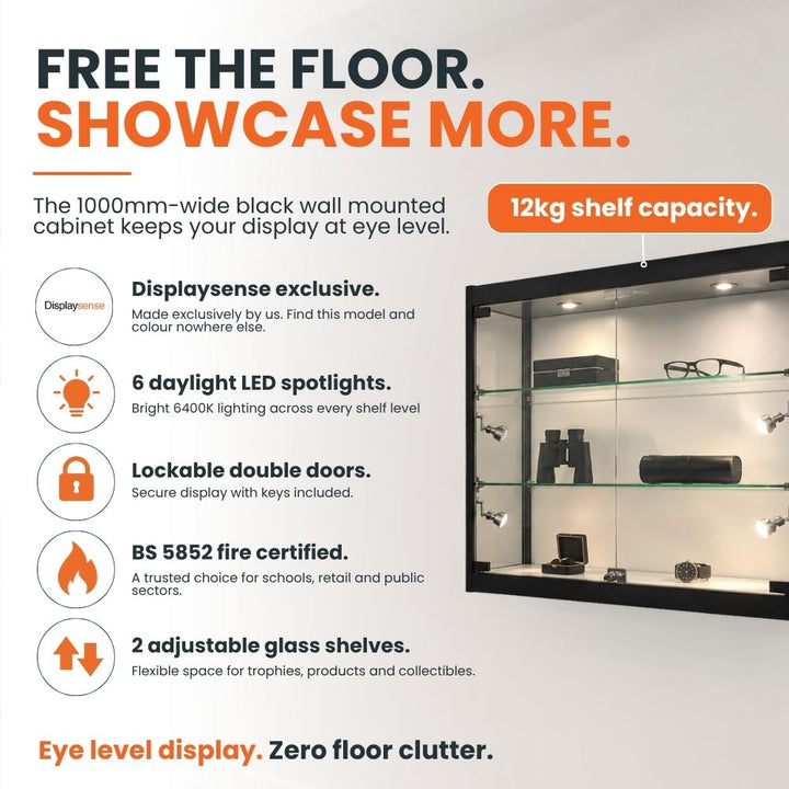 Feature graphic for a black wall mounted glass display cabinet showing six LED spotlights, 12kg shelf capacity, lockable doors and two adjustable glass shelves.

