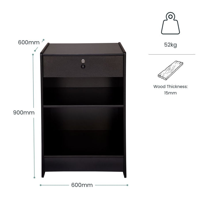 Specification image for a compact black wooden retail till block, showing 900mm height, 600mm width, 600mm depth, 52kg weight and 15mm wood thickness, with open shelving for shop tills, payment areas, point-of-sale counters and customer service spaces.