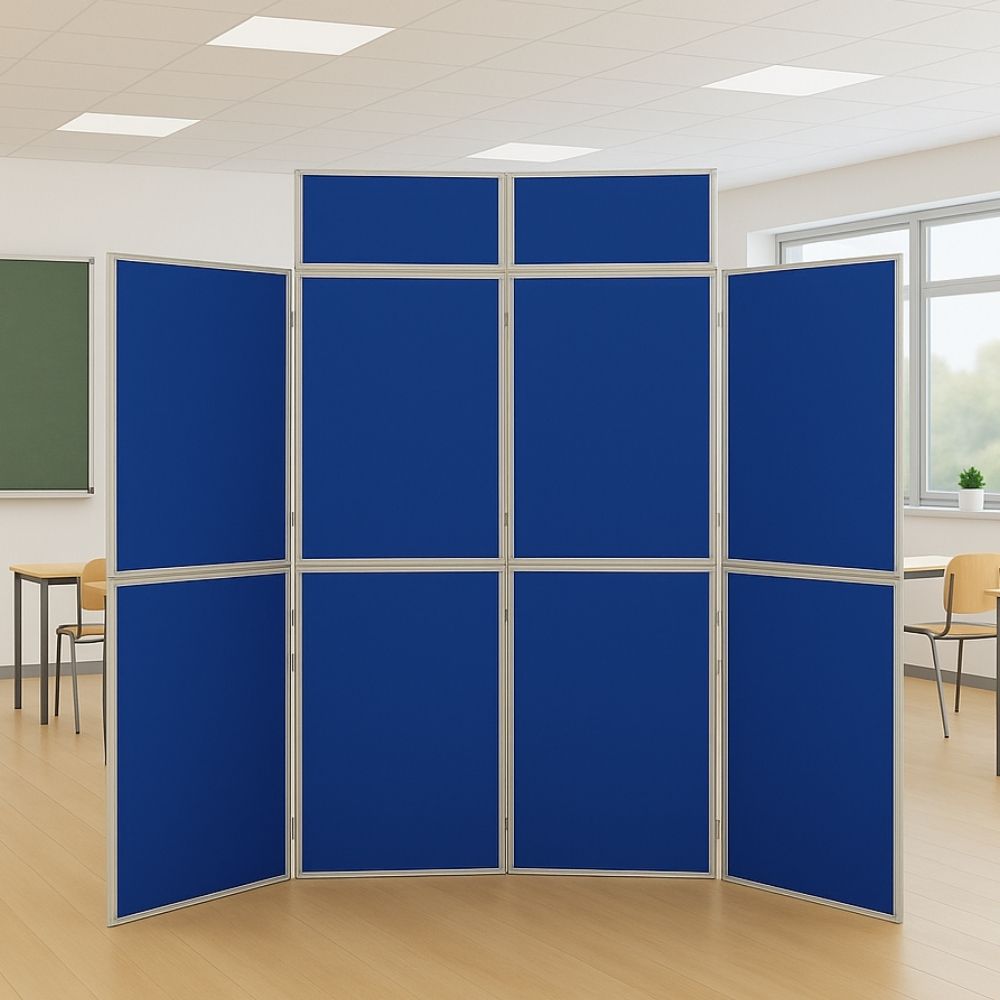 Blue eight-panel folding display board with silver frame, set up in a modern classroom with wooden flooring and desks in the background.

