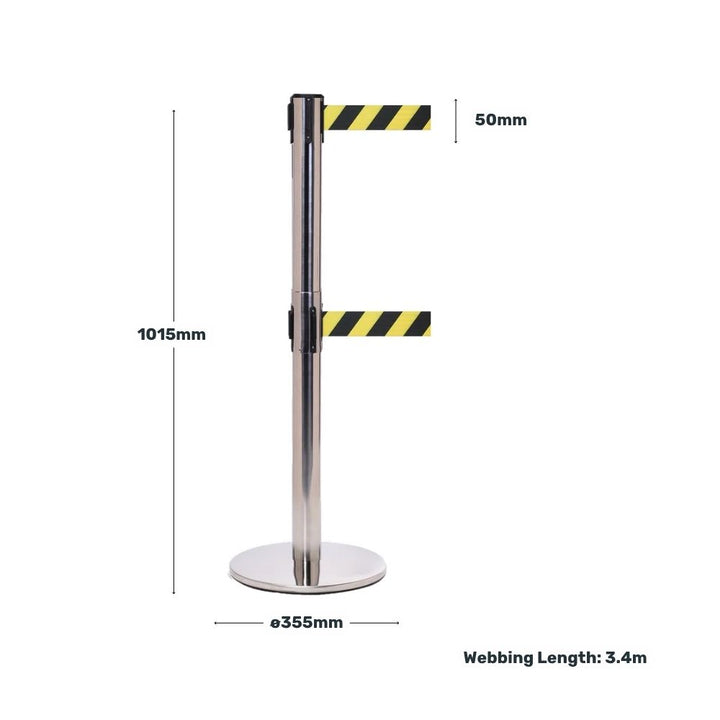 Chrome dual-belt barrier with yellow and black hazard webbing showing post height, base diameter, belt width, and total webbing length.