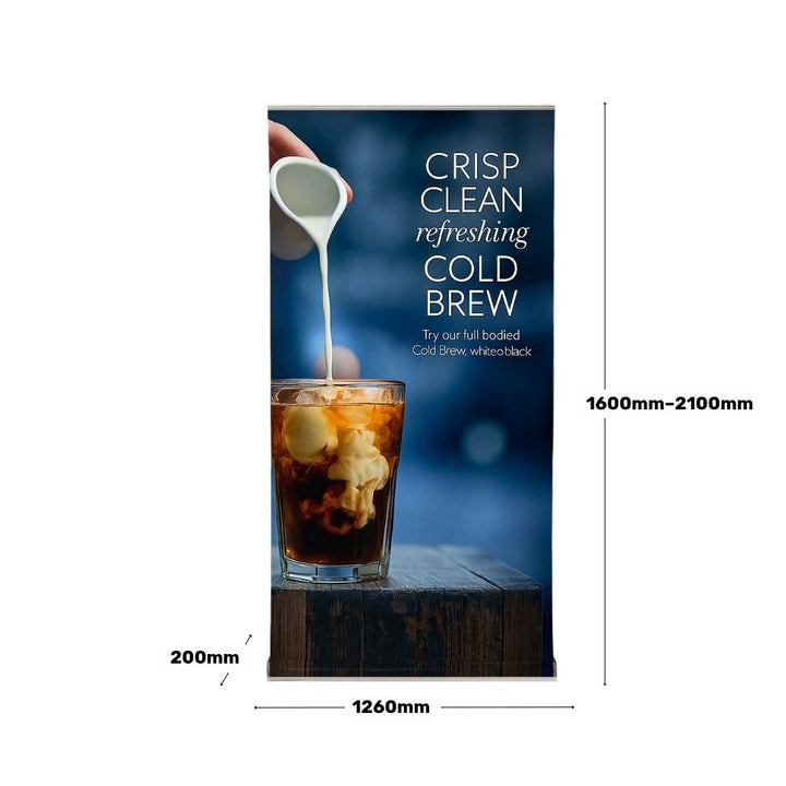 Cold brew coffee banner with pouring milk graphic and size dimensions shown—1260mm width and height adjustable from 1600mm to 2100mm—ideal for cafes and food service promotions.

