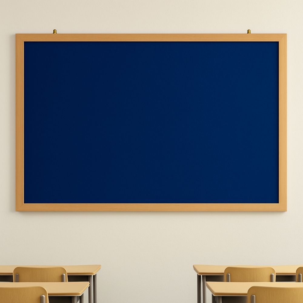 Dark blue felt noticeboard with wooden frame displayed face-on in a school classroom above desks, size 1200mm x 900mm.


