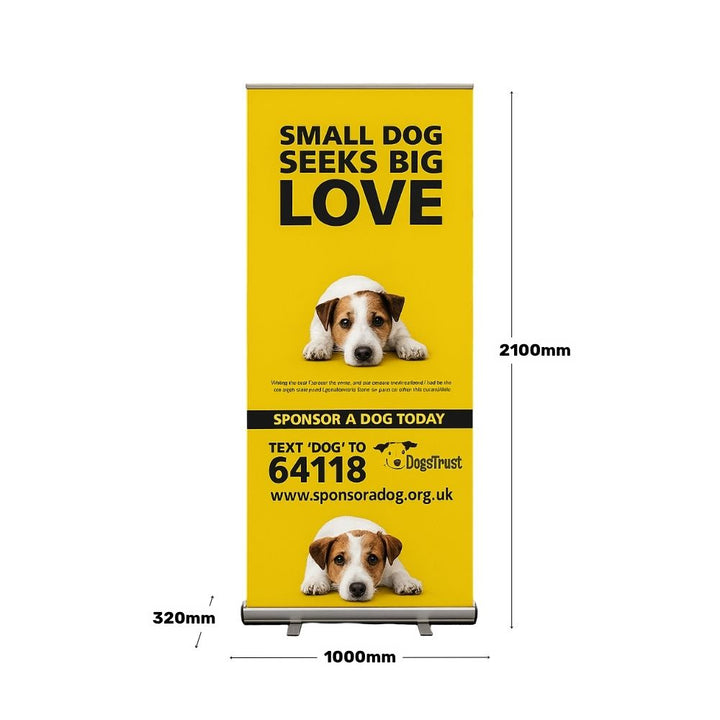 Dogs Trust display banner with measurements, showing a yellow background, Jack Russell illustrations, and a call to action to sponsor a dog via SMS.

