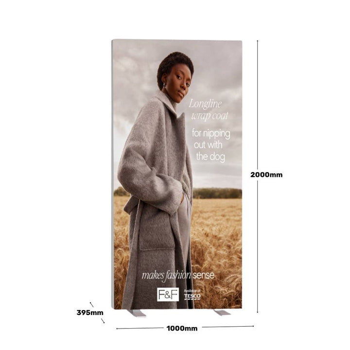 Freestanding LED lightbox display with double-sided printing showing a model in a grey longline wrap coat – dimensions 1000mm x 2000mm.

