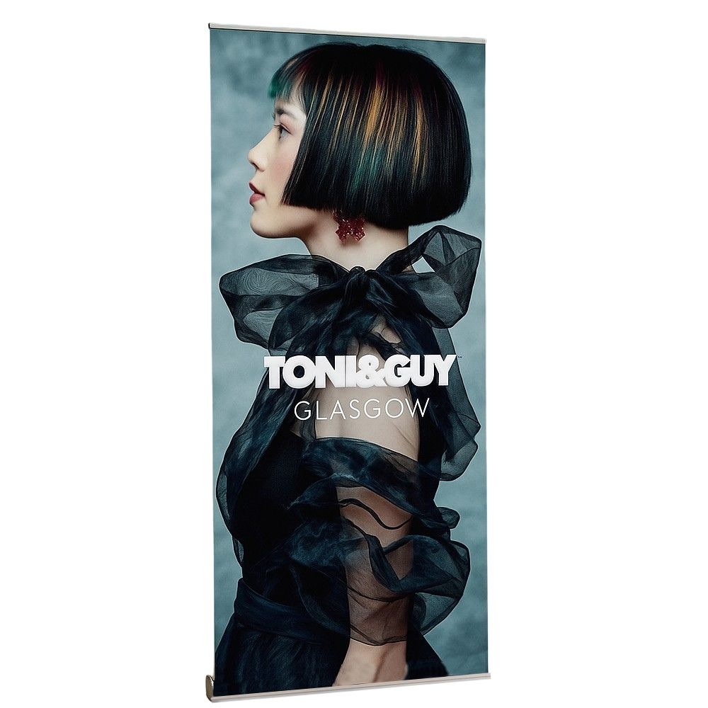 Freestanding promotional roller banner with Toni & Guy Glasgow branding, perfect for hair salons and beauty studio marketing.


