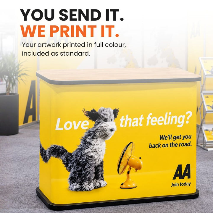 Portable counter wrapped in full-colour custom artwork across the front and sides, finished with a woodgrain countertop.