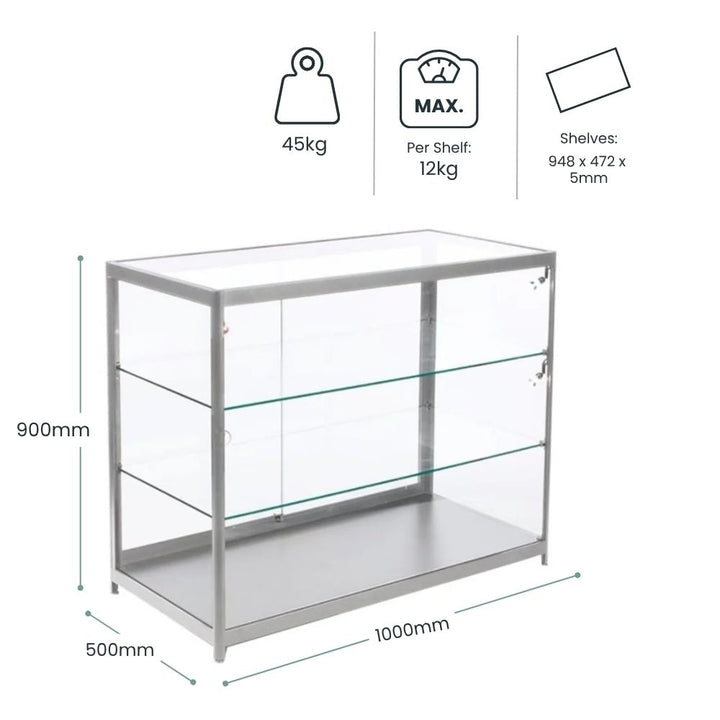 Dimension diagram: silver glass display counter 900mm tall, 1000mm wide, 500mm deep, 45kg unit weight, 12kg per shelf, glass shelves 948 x 472 x 5mm.

