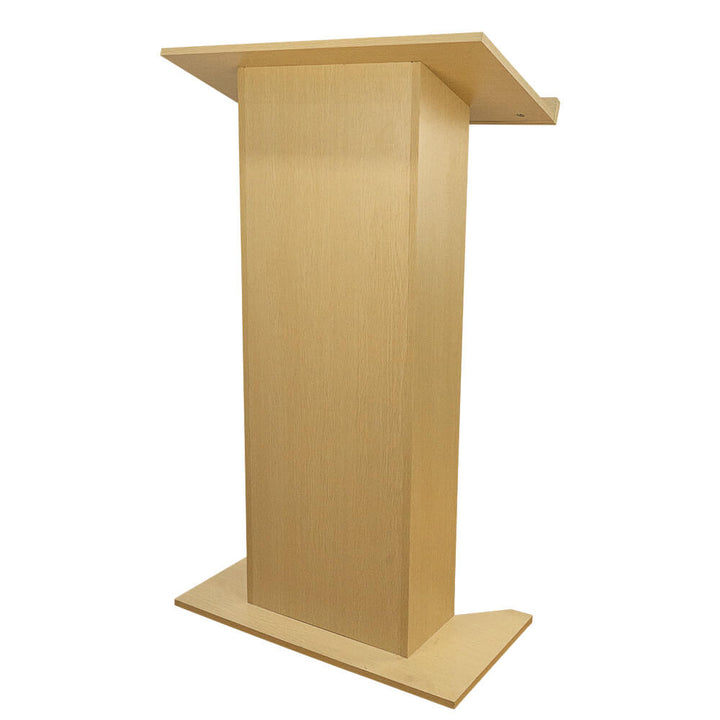 Side-profile cut-out of a light wood floor-standing lectern showing the angled reading surface, flat rectangular base and solid enclosed front panel.

