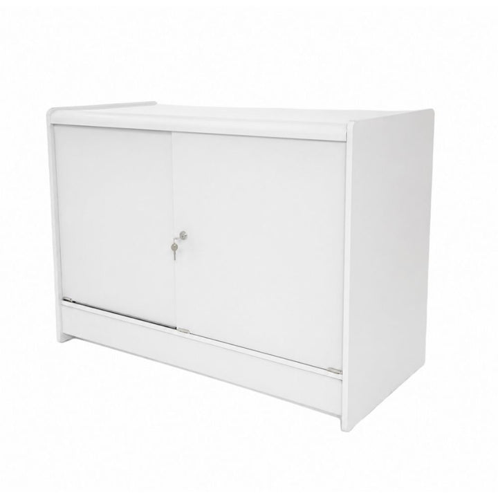 Rear view of a white glass retail display counter showing solid lockable sliding storage doors with key access, providing secure back-of-counter storage for stock, packaging, till supplies and valuable merchandise in busy shop and point-of-sale areas.