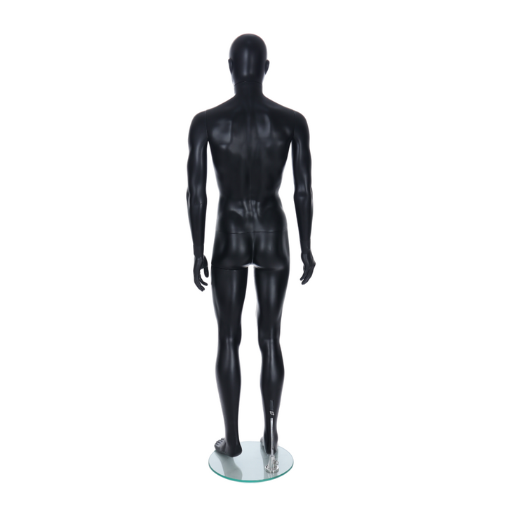Modern matt black female mannequin with an egghead shape and ears, freestanding for stylish clothing displays.
