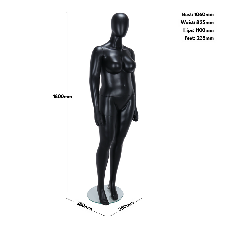 This full-bodied plus-sized female mannequin, finished in matt black with a smooth egghead design, stands in a balanced pose, making it ideal for visual merchandising.
