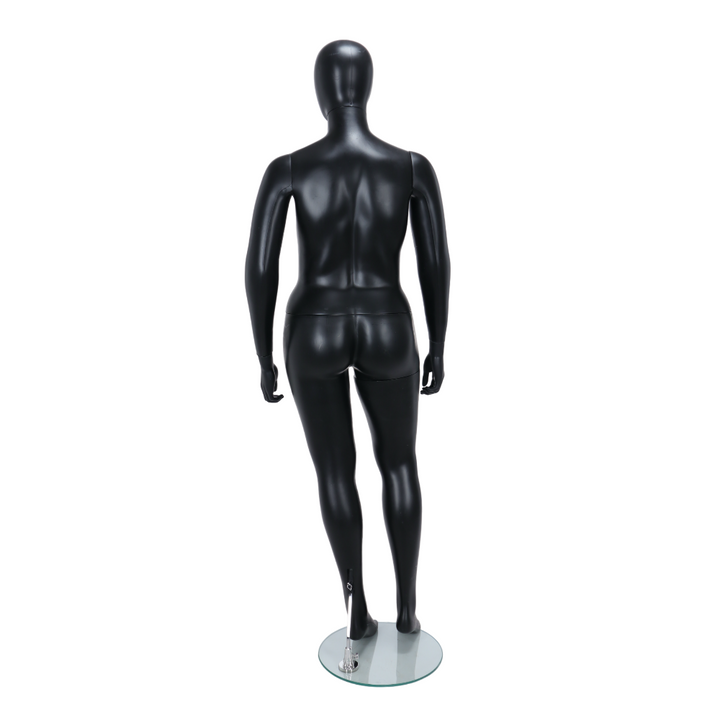 A high-quality plus-sized female mannequin with a matt black egghead design, posed in a standing position, offering a sleek and modern look for fashion displays.
