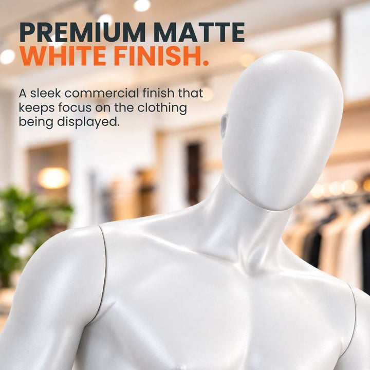 Detailed view of the faceless head, shoulders and torso highlighting the smooth matt white finish of the male retail mannequin.