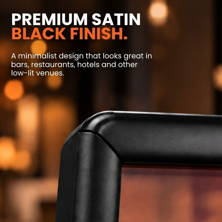 Close-up of the satin black powder-coated snap frame, highlighting its rounded corner and low-sheen finish for darker interiors.