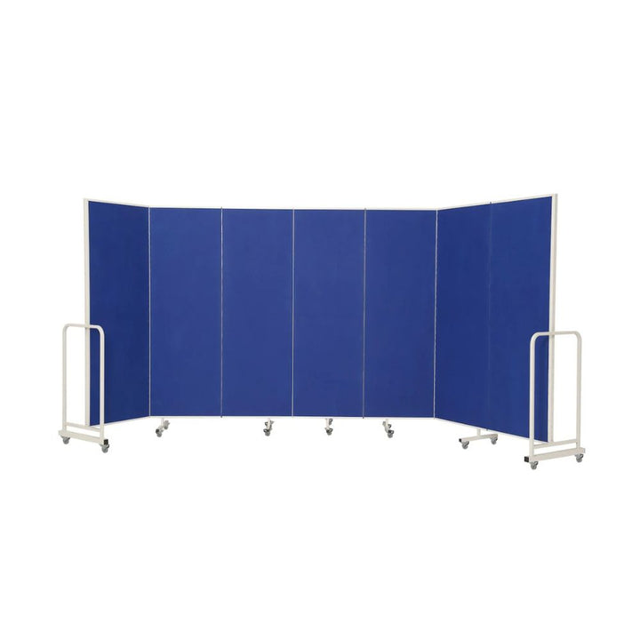 Blue felt seven-panel room divider on castors, folded into a shallow curve with hinged panels and end frames, for dividing large open spaces.

