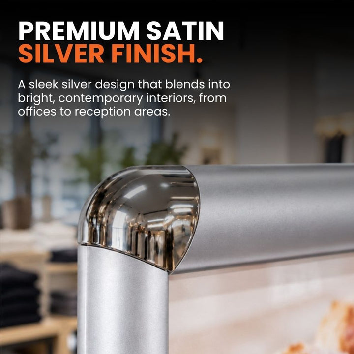 Detailed view of the satin silver frame and rounded polished corner on the freestanding A4 poster display stand.