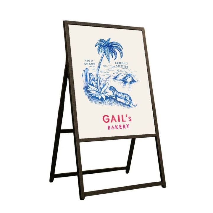Single-sided A1 poster easel with thickened black aluminium frame and V-shaped base, specified for hotel lobbies and boutique retail entrances.
