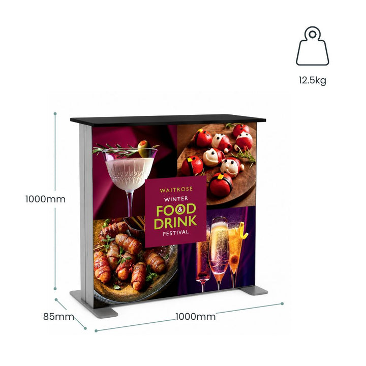 Waitrose branded exhibition counter with annotated dimensions, 12.5kg weight specification and illuminated graphic panels for promotional displays.