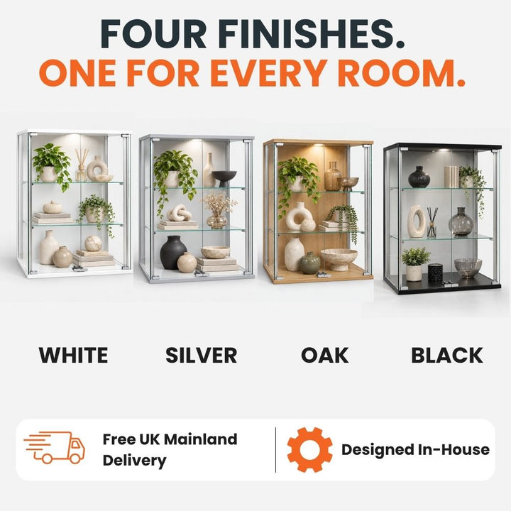 Four versions of the 600mm wall display cabinet arranged together in white, silver, oak and black finishes.