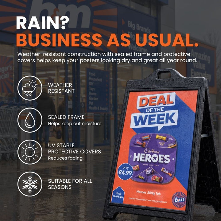 Weather-resistant black A1 A-board pavement sign displaying a retail promotion outside in the rain.