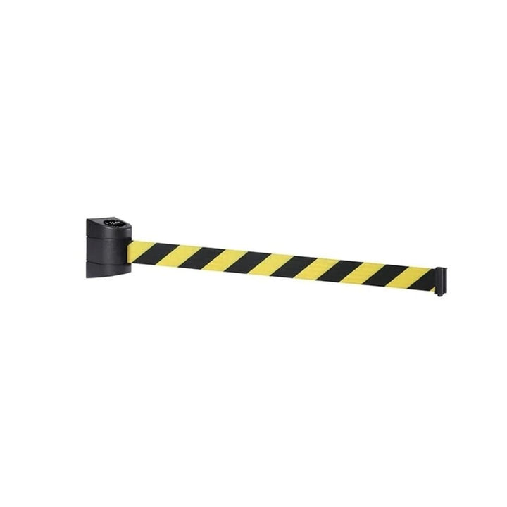 Close-up of a yellow and black wall-mounted retractable barrier with extended striped webbing on a white background.