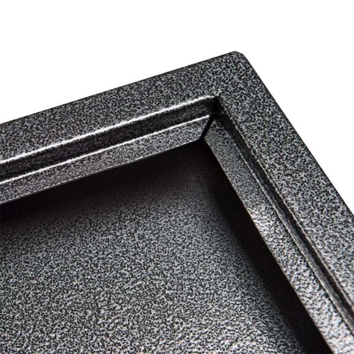 Close-up of the corner of the black hammered effect aluminium frame on the 3 x A4 menu board, showing the textured scratch-resistant finish.
