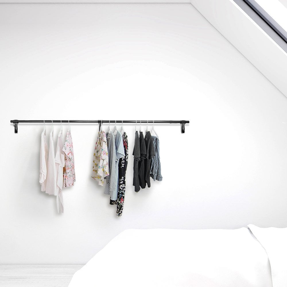 6ft wide black wall-mounted steel clothes rail with sturdy support arms, ideal for home or retail storage.
