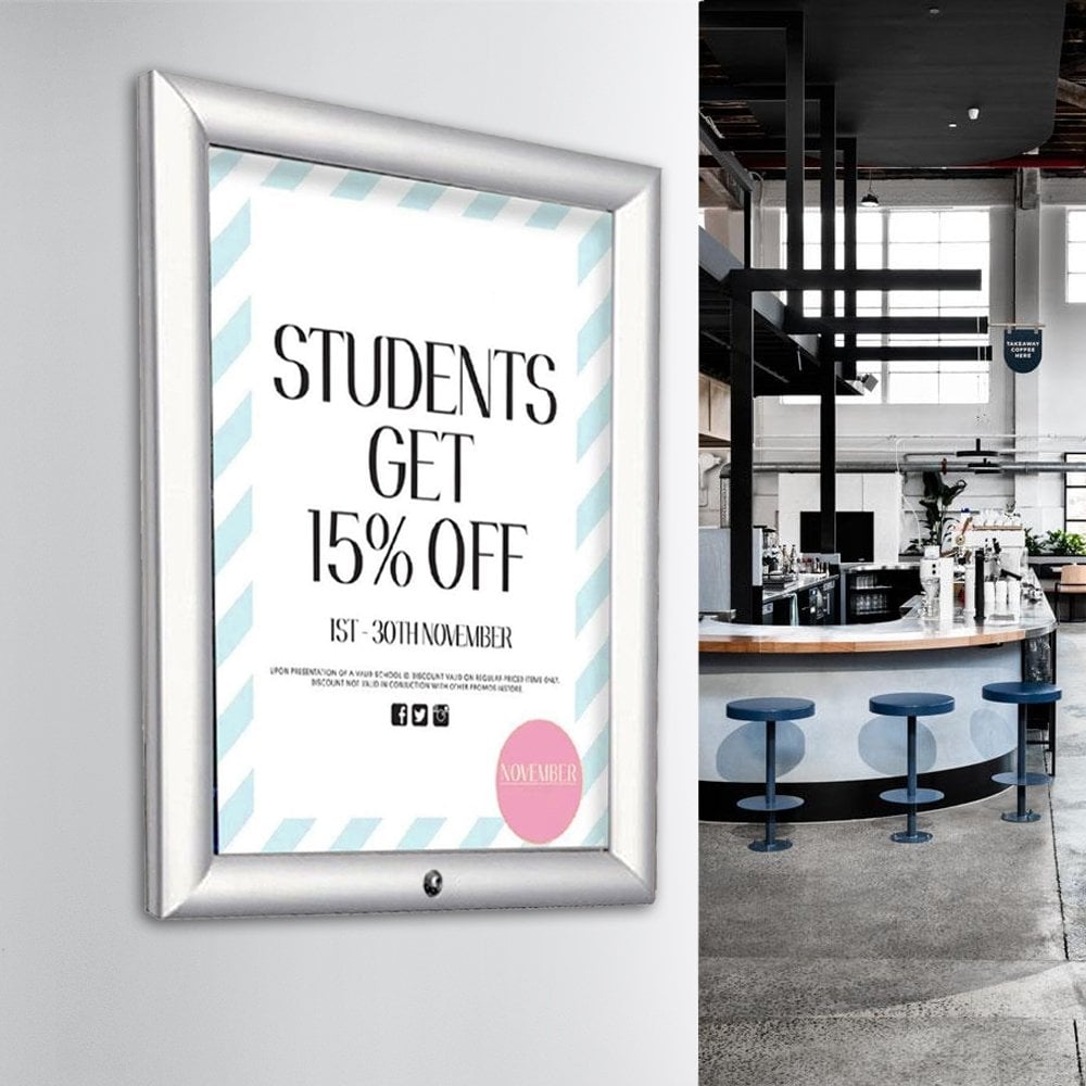 A2 lockable silver aluminium poster snap frame with a 32mm mitred frame, includes wall fixings for secure mounting.
