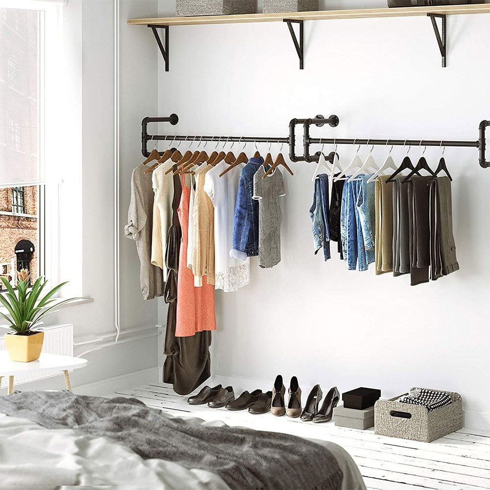 Set of two black industrial pipe clothes rails, wall-mounted design, 1100mm wide, ideal for stylish and sturdy hanging storage.