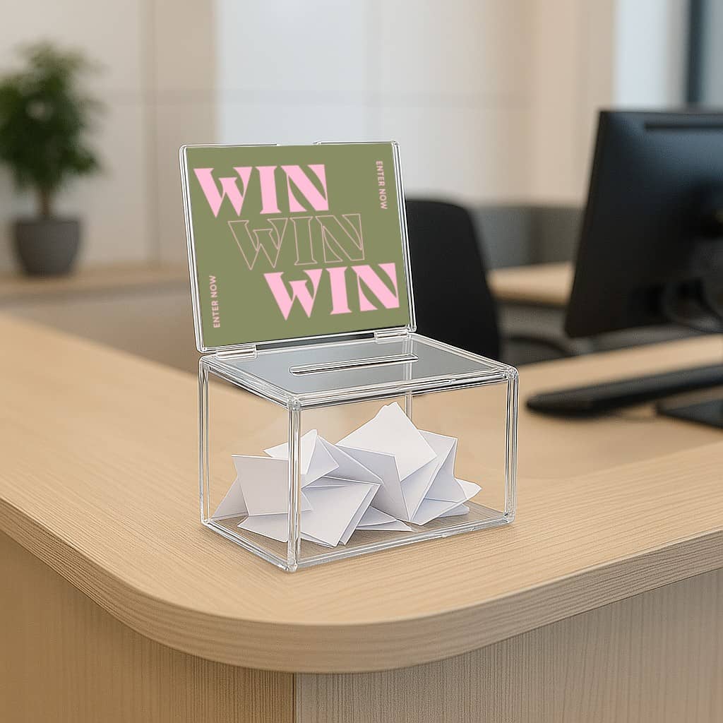 Set of six small transparent acrylic suggestion boxes, each with an insert slot, ideal for gathering ideas or comments.
